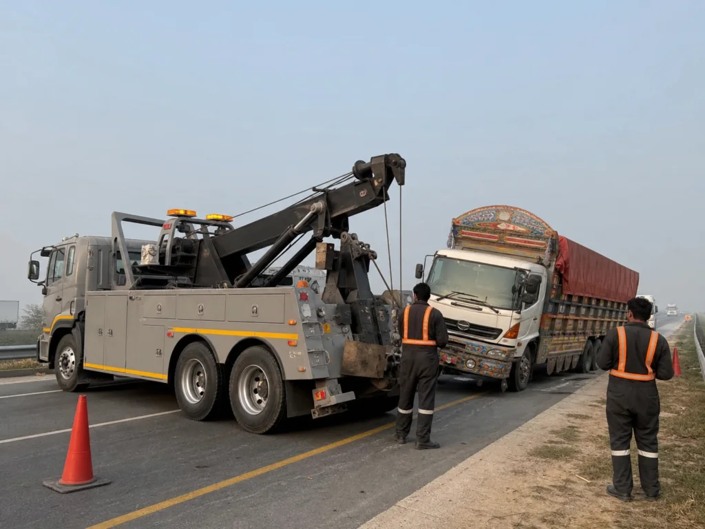 Heavy recovery truck assisting a commercial vehicle